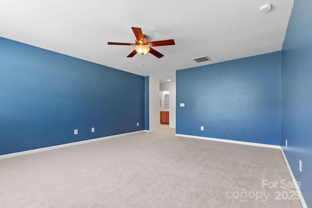 159 E Warfield Dr, Mooresville, NC 28115 - carpeted spare room with a smoke detector and ceiling fan