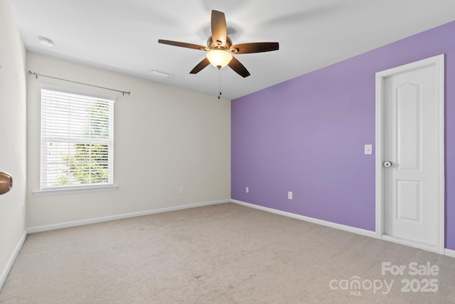 159 E Warfield Dr, Mooresville, NC 28115 - empty room featuring a ceiling fan, carpet flooring, and a smoke detector