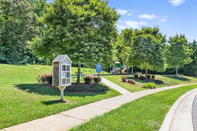 159 E Warfield Dr, Mooresville, NC 28115 - view of home's community with a yard and view of scattered trees