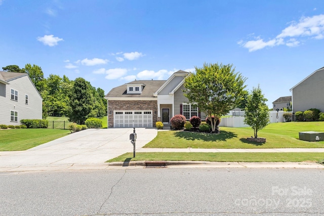159 E Warfield Dr, Mooresville, NC 28115 - view of front of home with concrete driveway, a garage, and stone siding