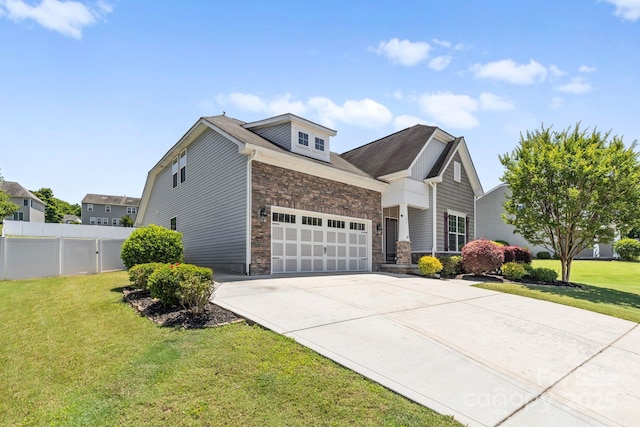 159 E Warfield Dr, Mooresville, NC 28115 - craftsman-style house with stone siding, driveway, and an attached garage