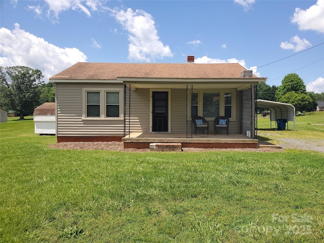 3558 Sunset Grill St, Connelly Springs, NC 28612 - view of front of home featuring a porch, a front lawn, a carport, and driveway