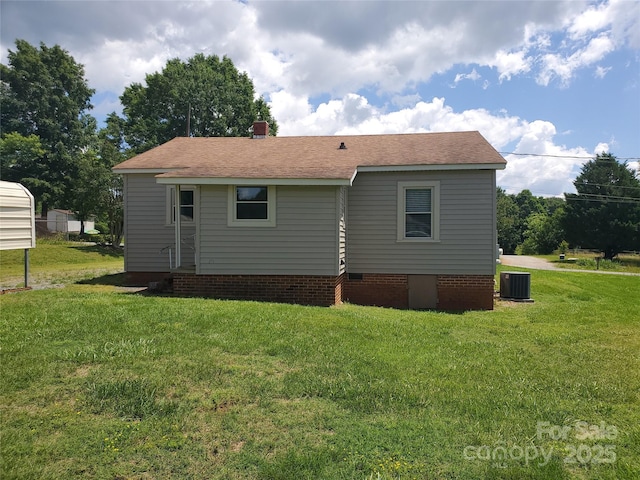 3558 Sunset Grill St, Connelly Springs, NC 28612 - back of house with a yard, a shingled roof, and a chimney