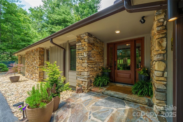 23 Indigo Way, Hendersonville, NC 28739 - property entrance featuring stone siding