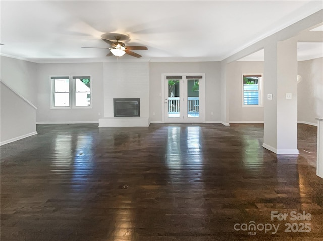 27 Quayside Ct, Clover, SC 29710 - unfurnished living room with a ceiling fan, healthy amount of natural light, dark wood finished floors, and a fireplace