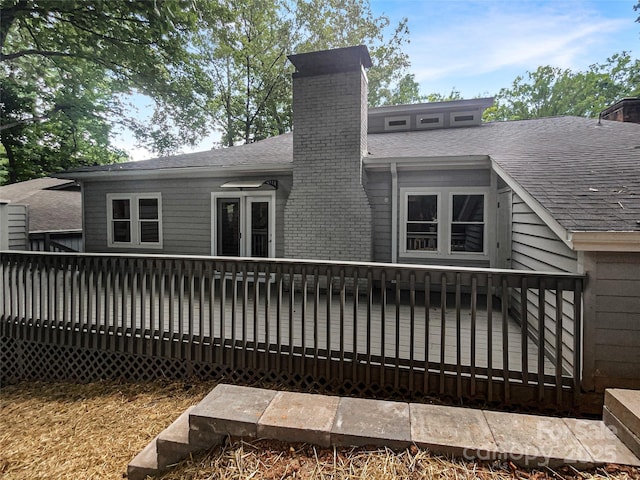27 Quayside Ct, Clover, SC 29710 - rear view of house featuring a chimney, a shingled roof, and a wooden deck