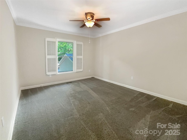 27 Quayside Ct, Clover, SC 29710 - spare room with a ceiling fan, dark colored carpet, and crown molding