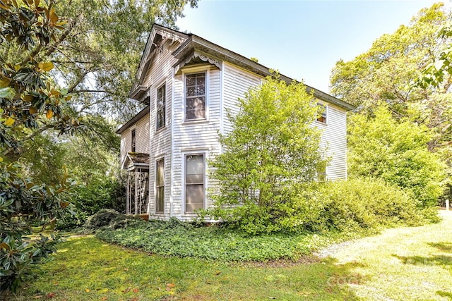 504 Potts St, Davidson, NC 28036 - view of home's exterior featuring a lawn