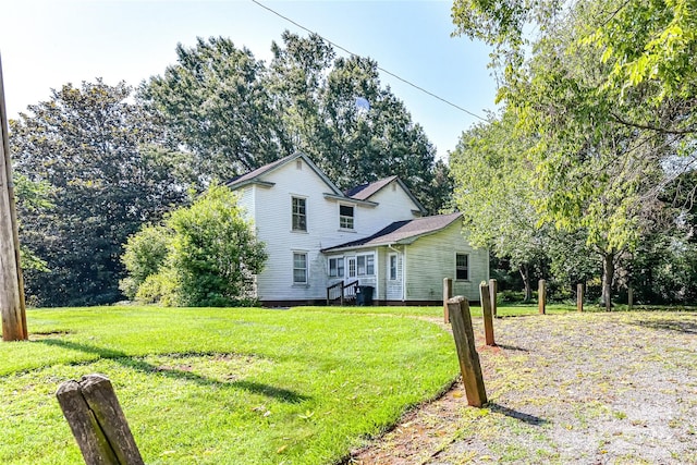 504 Potts St, Davidson, NC 28036 - rear view of property with a yard
