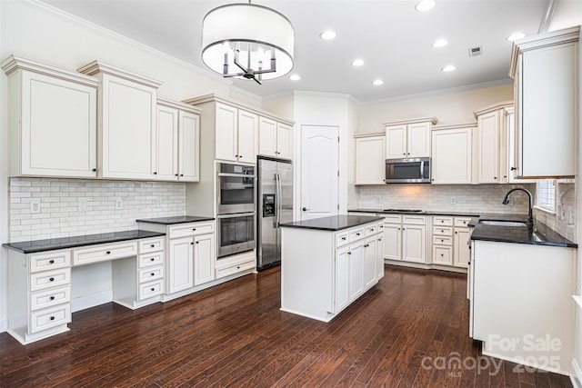 646 Quicksilver Trl Unit 183, Fort Mill, SC 29708 - kitchen featuring stainless steel appliances, dark countertops, ornamental molding, a kitchen island, and recessed lighting