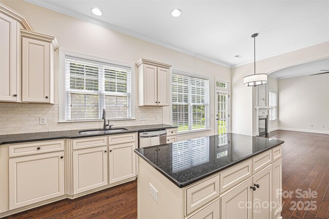 646 Quicksilver Trl Unit 183, Fort Mill, SC 29708 - kitchen with dark wood-style floors, crown molding, decorative backsplash, recessed lighting, and dark stone countertops