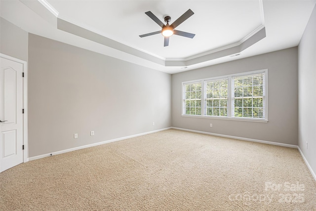 646 Quicksilver Trl Unit 183, Fort Mill, SC 29708 - unfurnished room with a tray ceiling, crown molding, light colored carpet, and a ceiling fan