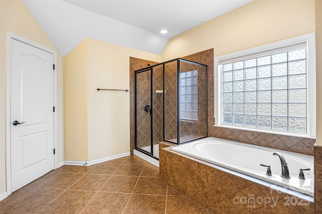 646 Quicksilver Trl Unit 183, Fort Mill, SC 29708 - bathroom with a bath, a stall shower, tile patterned flooring, vaulted ceiling, and recessed lighting