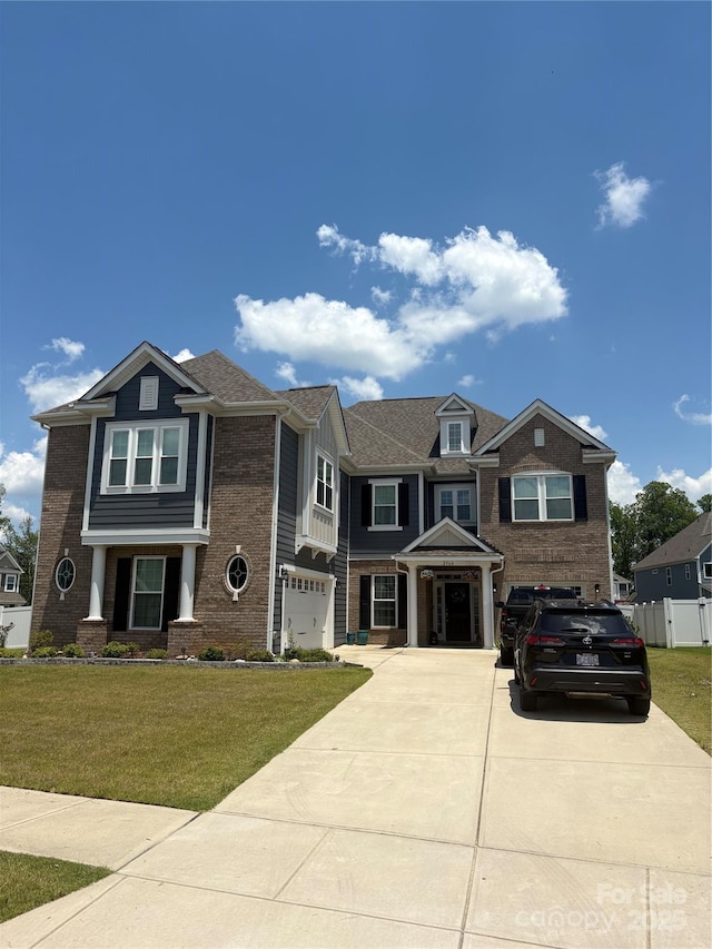 2960 Haley Cir, Davidson, NC 28036 - view of front of home with brick siding, driveway, and a garage