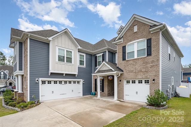2960 Haley Cir, Davidson, NC 28036 - view of front of property featuring an attached garage, driveway, board and batten siding, and a front lawn