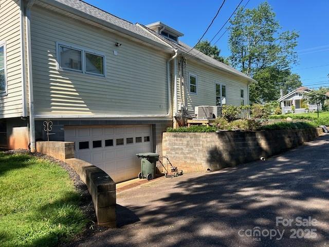 743 S College Ave, Newton, NC 28658 - view of home's exterior with an attached garage and concrete driveway