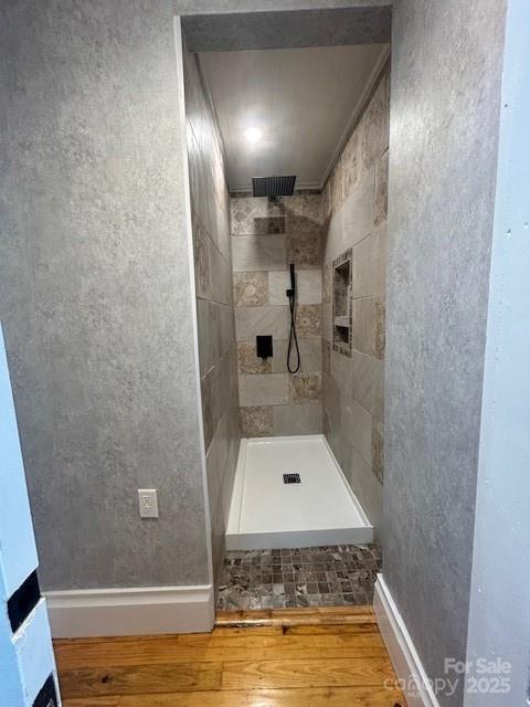 743 S College Ave, Newton, NC 28658 - full bathroom featuring a tile shower and wood finished floors