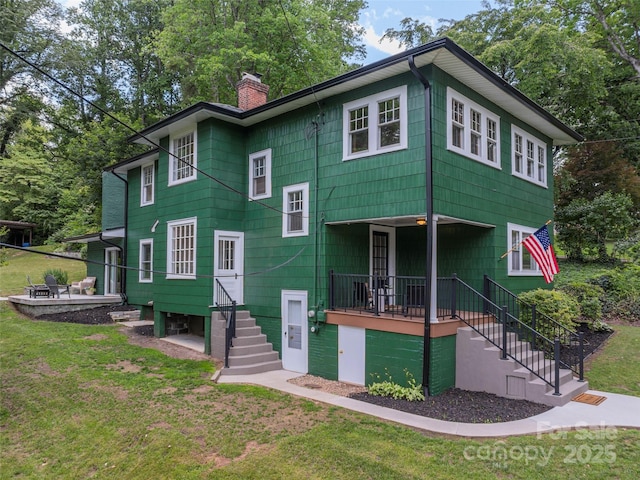 50 Skyland Ter, Canton, NC 28716 - back of house featuring a yard, a chimney, and stairway