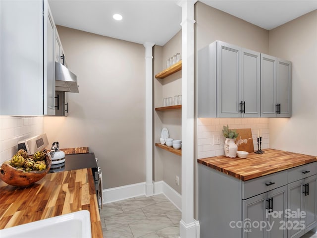 50 Skyland Ter, Canton, NC 28716 - kitchen featuring wooden counters, range hood, gray cabinetry, light marble finish flooring, and open shelves