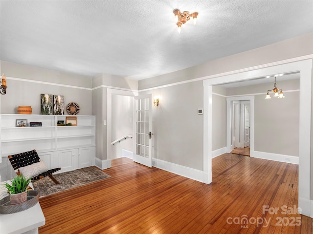 50 Skyland Ter, Canton, NC 28716 - living area with a chandelier, hardwood / wood-style floors, and french doors