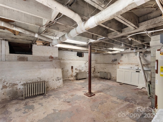50 Skyland Ter, Canton, NC 28716 - unfinished basement featuring radiator heating unit and electric water heater