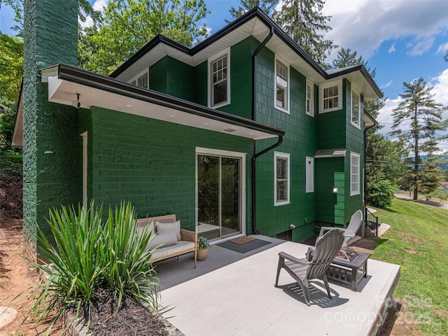 50 Skyland Ter, Canton, NC 28716 - back of property featuring a patio, a chimney, and a yard