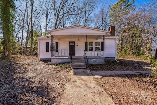 1229 Jenkins St, Rock Hill, SC 29732 - bungalow-style house featuring a chimney and a porch