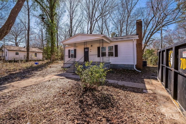1229 Jenkins St, Rock Hill, SC 29732 - view of front of home featuring covered porch and a chimney