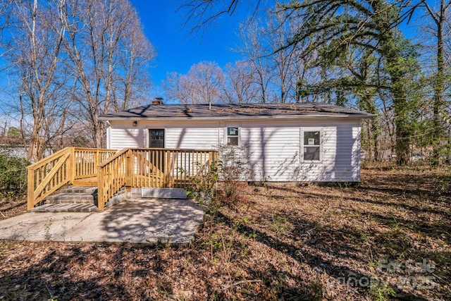 1229 Jenkins St, Rock Hill, SC 29732 - back of house with a patio area, a chimney, and a wooden deck