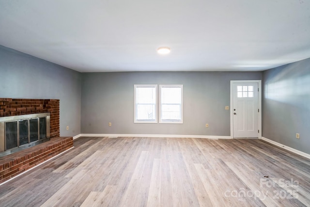 1229 Jenkins St, Rock Hill, SC 29732 - unfurnished living room with wood finished floors and a fireplace
