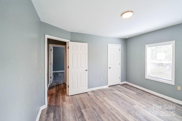 1229 Jenkins St, Rock Hill, SC 29732 - unfurnished bedroom with wood finished floors and baseboards