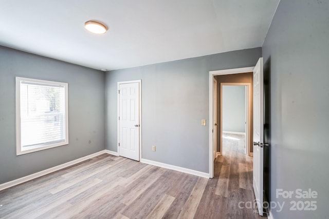 1229 Jenkins St, Rock Hill, SC 29732 - unfurnished bedroom with wood finished floors and a closet