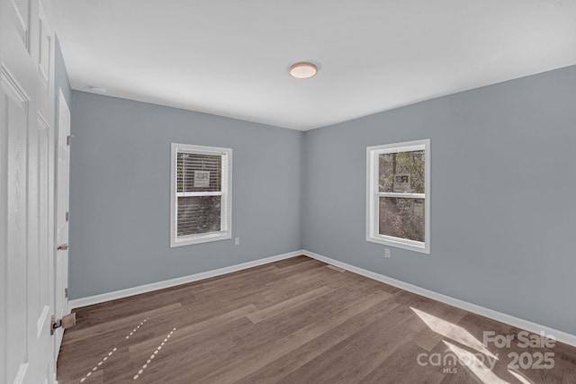 1229 Jenkins St, Rock Hill, SC 29732 - unfurnished room with wood finished floors and baseboards