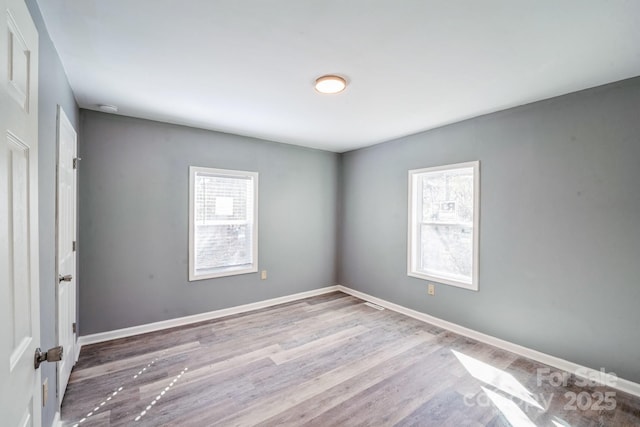 1229 Jenkins St, Rock Hill, SC 29732 - empty room featuring wood finished floors and a smoke detector