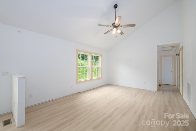 1036 Williamsburg Dr, Lenoir, NC 28645 - empty room featuring light wood-style flooring, high vaulted ceiling, and a ceiling fan
