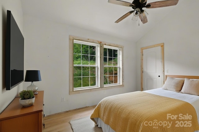 1036 Williamsburg Dr, Lenoir, NC 28645 - bedroom featuring light wood-style flooring, vaulted ceiling, and ceiling fan