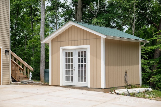 1036 Williamsburg Dr, Lenoir, NC 28645 - view of outbuilding featuring stairs, view of scattered trees, and french doors