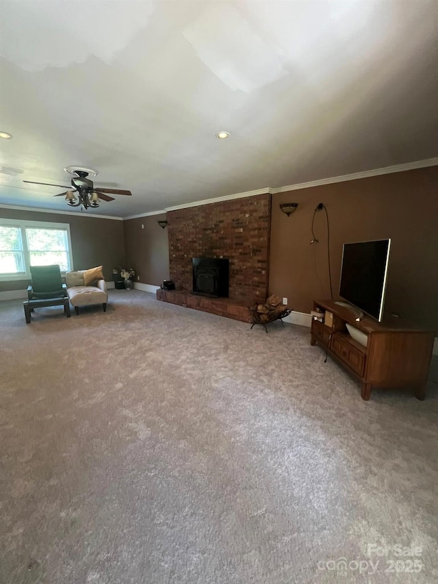 2437 Knox Station Rd, Chester, SC 29706 - unfurnished living room featuring carpet flooring, ceiling fan, a fireplace, crown molding, and recessed lighting