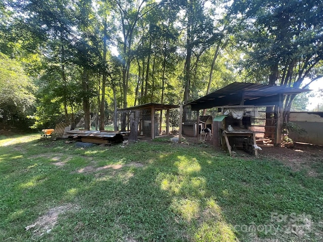 2437 Knox Station Rd, Chester, SC 29706 - view of grassy yard with exterior structure and an outbuilding