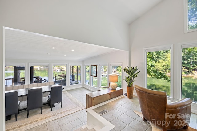 208 Island View Rd, Mount Holly, NC 28120 - living room featuring tile patterned floors, high vaulted ceiling, and recessed lighting
