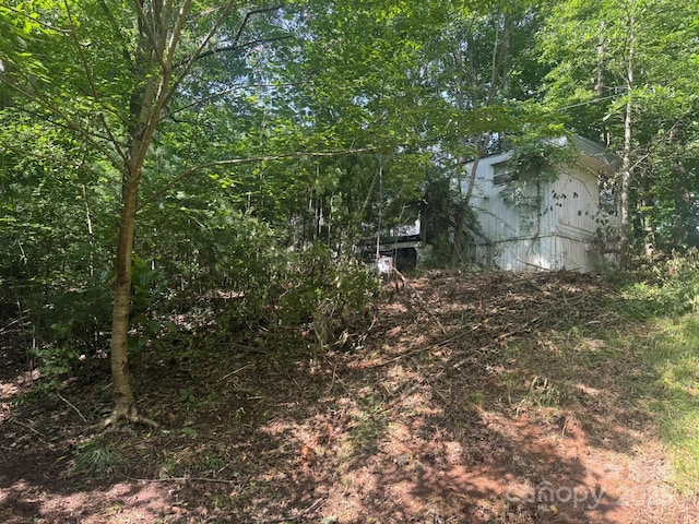 1290 Gardiol Ave NE, Valdese, NC 28690 - view of yard featuring a shed