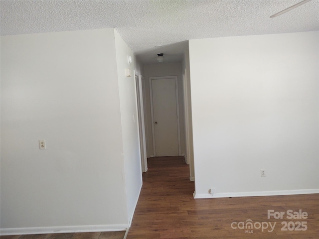 2100 Airport Rd, Salisbury, NC 28147 - unfurnished room featuring wood finished floors and a textured ceiling