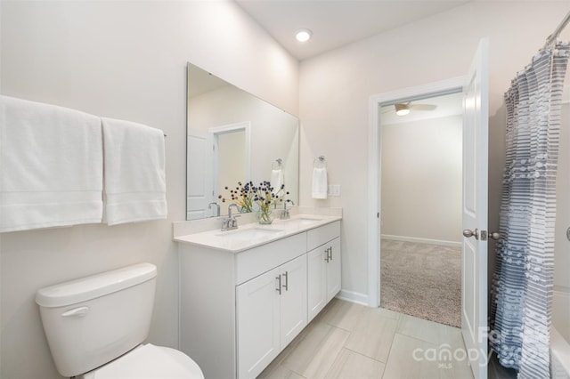 9311 Dunwich Dr, Gastonia, NC 28056 - full bath with double vanity, curtained shower, a ceiling fan, and tile patterned flooring