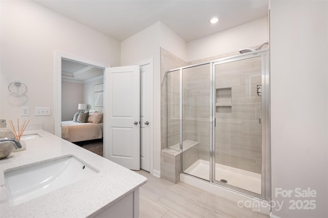 9311 Dunwich Dr, Gastonia, NC 28056 - ensuite bathroom with double vanity, a shower stall, and tile patterned floors