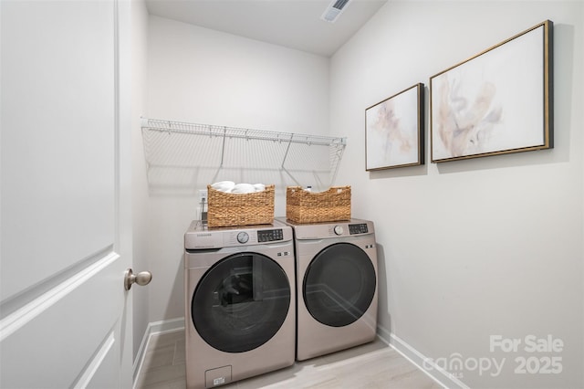 9311 Dunwich Dr, Gastonia, NC 28056 - washroom featuring separate washer and dryer and baseboards