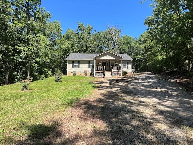 5550 Hillsdale St, Fort Lawn, SC 29714 - view of front facade featuring a porch, a front yard, crawl space, and driveway