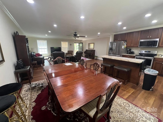 5550 Hillsdale St, Fort Lawn, SC 29714 - dining room featuring crown molding, wood finished floors, a ceiling fan, and recessed lighting