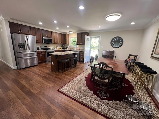 5550 Hillsdale St, Fort Lawn, SC 29714 - dining area with crown molding, dark wood finished floors, and recessed lighting