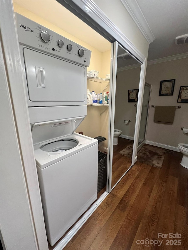 5550 Hillsdale St, Fort Lawn, SC 29714 - laundry room with estacked washer and dryer, ornamental molding, and wood finished floors