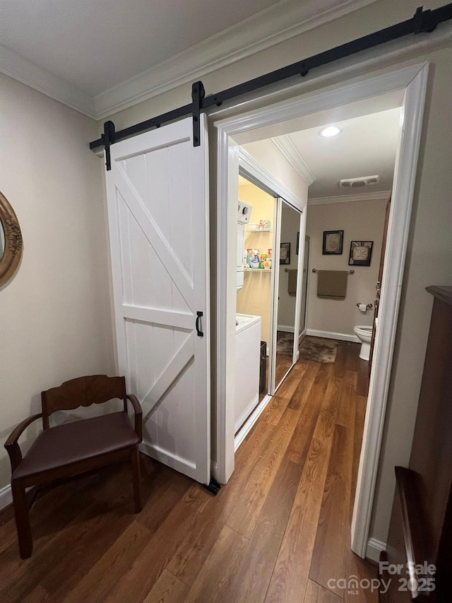 5550 Hillsdale St, Fort Lawn, SC 29714 - hallway featuring ornamental molding, dark wood-style floors, and a barn door